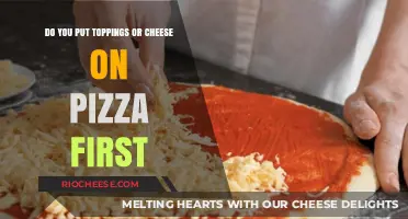 The Great Pizza Debate: Toppings vs. Cheese - Which Comes First?