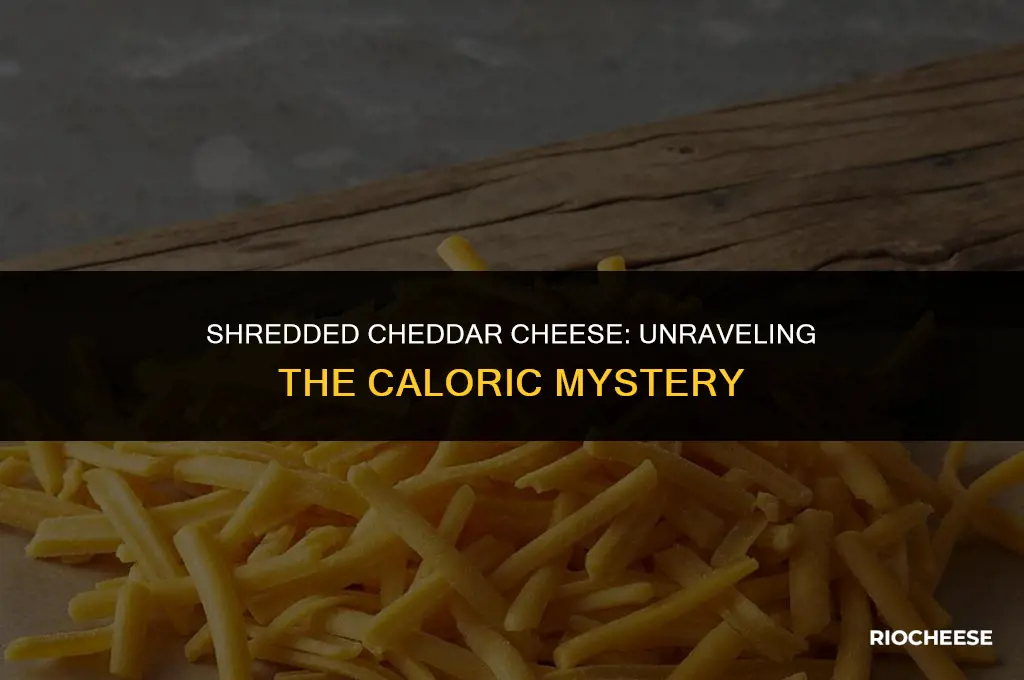 how many calories are in shredded cheddar cheese
