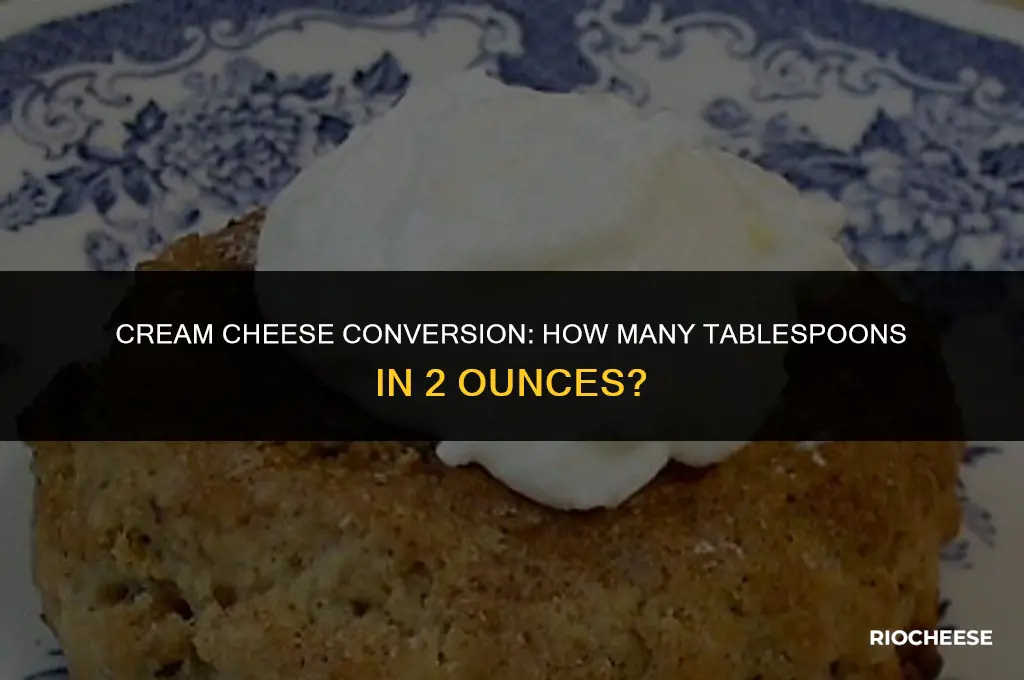 how many tablespoons is 2 oz of cream cheese